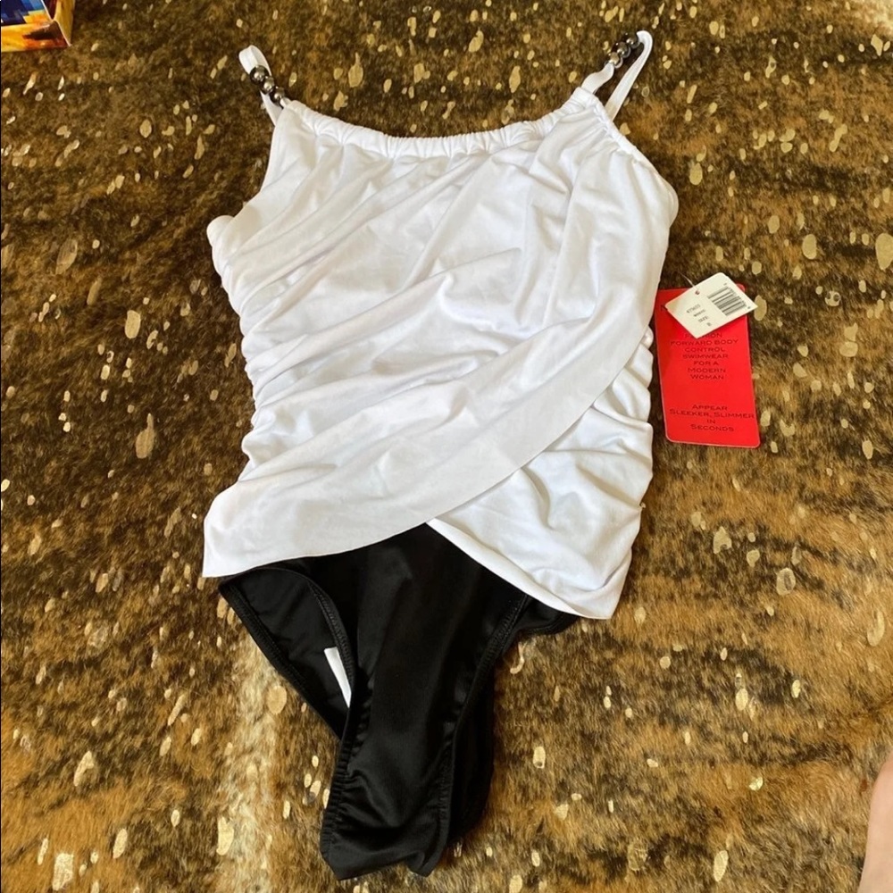 Size 8 miraclesuit new with tags